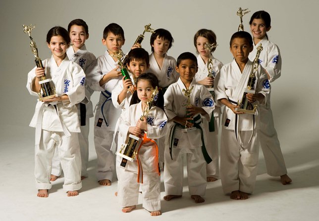 Children celebrate after the Annual Benefit Tournament